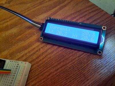 The LCD showing the temperature, along with a Low and a High